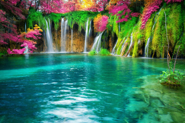 Exotic waterfall and lake landscape of Plitvice Lakes National Park, UNESCO natural world heritage and famous travel destination of Croatia. The lakes are located in central Croatia (Croatia proper).