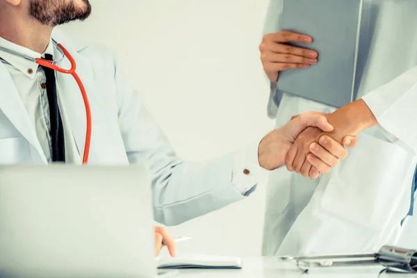 Doctor Hospital Giving Handshake Another Doctor Showing Success Teamwork Professional — Stock Photo, Image