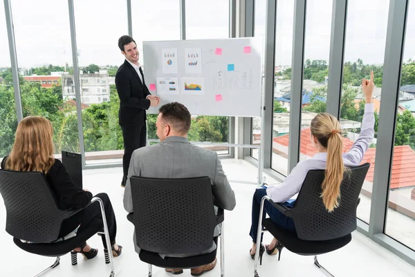 Businesswomen and businessmen attending group meeting conference in office room. Corporate business team concept.