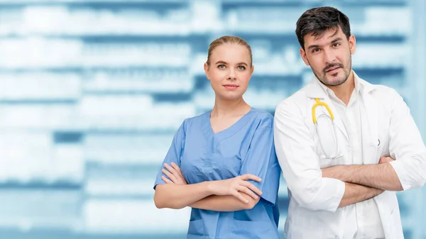 Doctors at hospital working with another doctor. — Stock Photo, Image