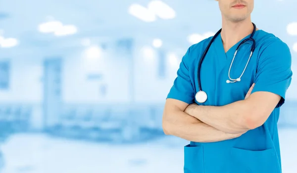 Young male doctor working at the hospital. — Stock Photo, Image