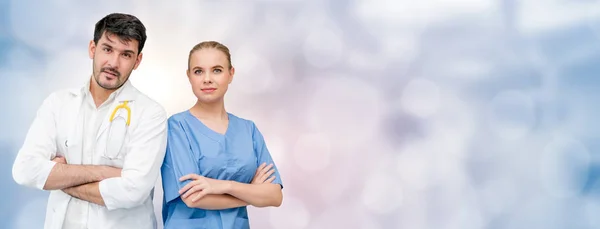 Doctors at hospital working with another doctor. — Stock Photo, Image