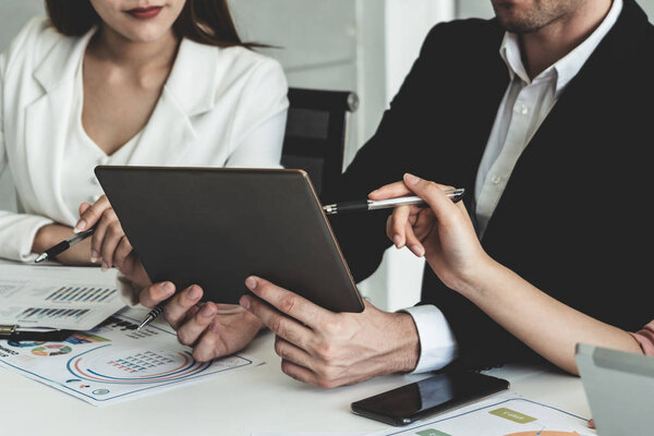 Businessman and businesswomen working in office.