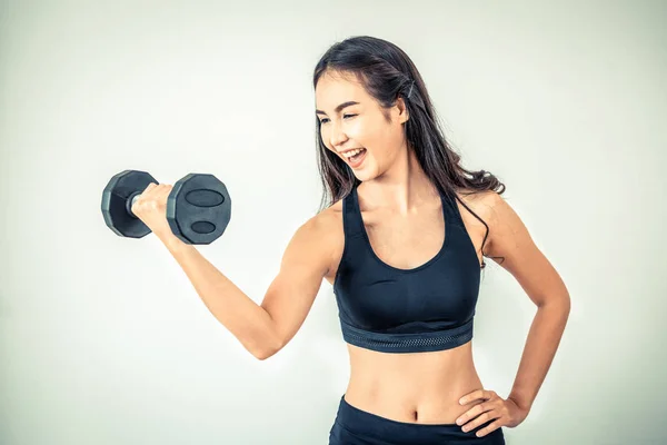 Sporty woman workout with dumbbell. — Stock Photo, Image