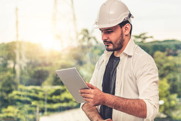 Young man architect or engineer in office