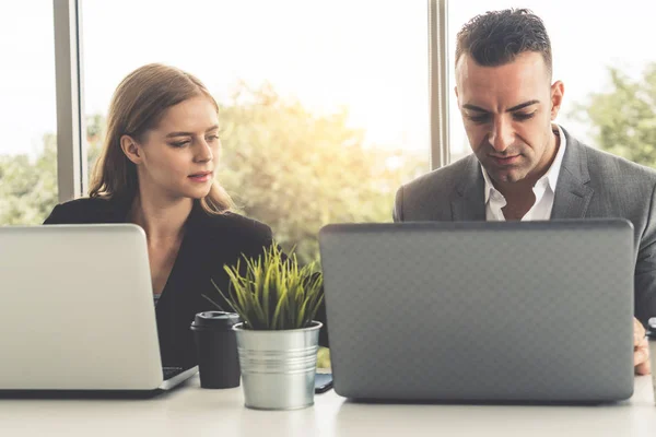 Businessman and businesswoman working in office. — Stock Photo, Image