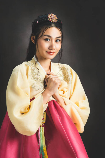 Korean woman in traditional korean dress (Hanbok).
