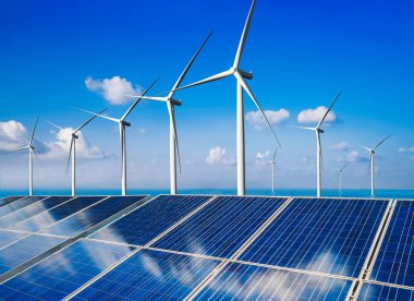 Güneş paneli ve rüzgar türbini çiftliği temiz enerji.
