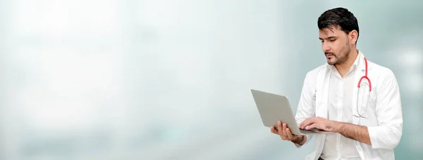 Doctor using laptop computer at the hospital. — Stock Photo, Image