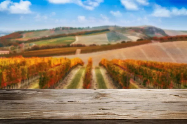 Wood table in autumn vineyard country landscape. — Stock Photo, Image