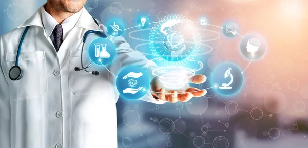 Medical Healthcare Research and Development Concept. Doctor in hospital lab with science health research icons looking at symbols of medical care technology innovation, medicine discovery and healthcare data.