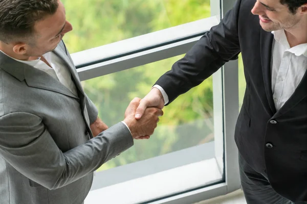 Businessmen handshake business deal in office. — Stock Photo, Image