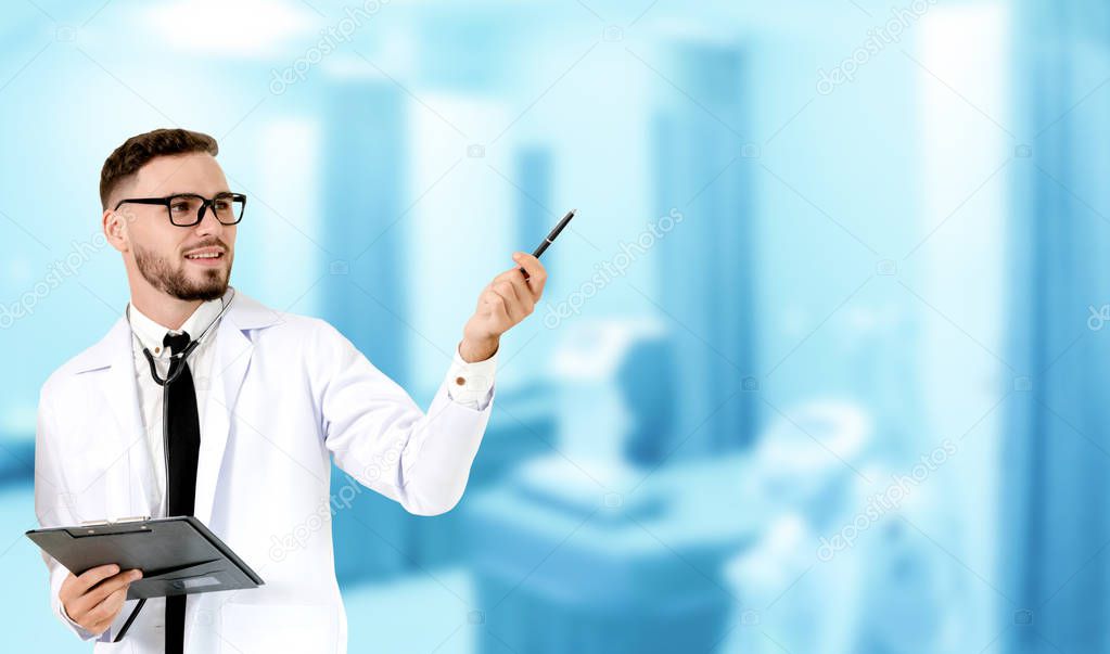 Doctor pointing at empty copy space for your text.