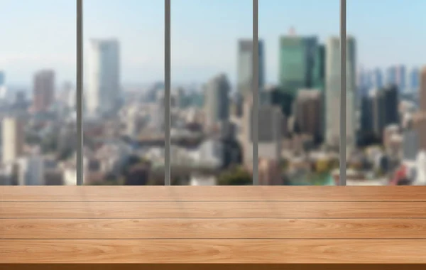 Wood table in city center modern office background