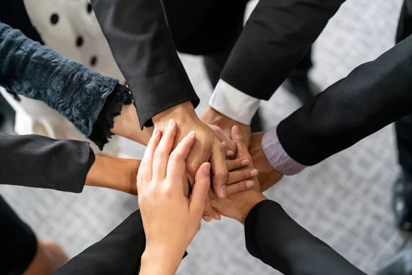 Many happy business people join hands together. — Stock Photo, Image