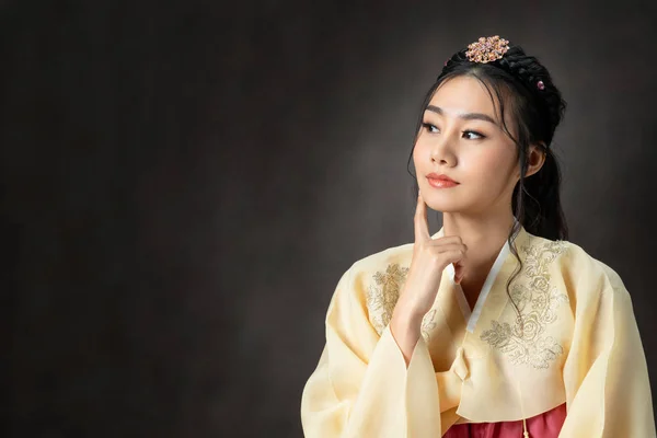Korean woman in traditional korean dress (Hanbok).