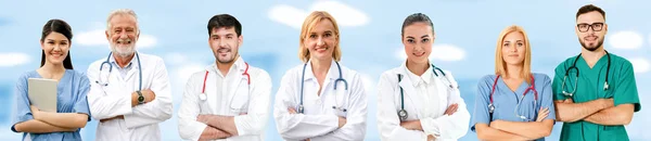 stock image Doctor working in hospital with other doctors.