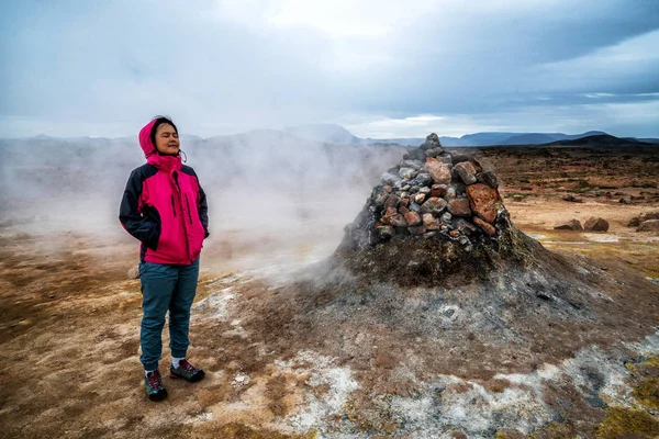 Woman traveler at Hverir, Namafjall in Iceland — Stock Photo, Image
