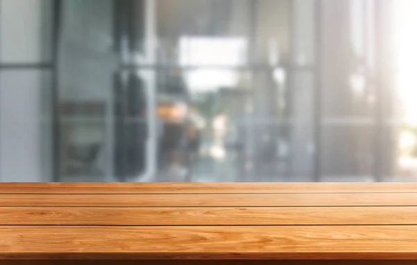 Wood table in city center modern office background