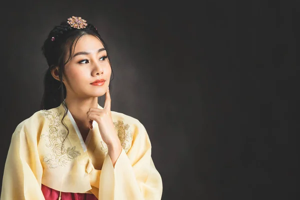 Korean woman in traditional korean dress (Hanbok).