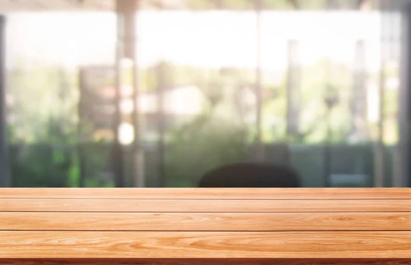 Wood table in city center modern office background