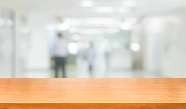 Wood table in modern hospital building interior. — Stock Photo, Image
