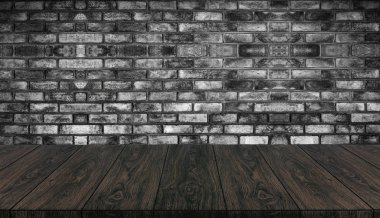 Tuğla duvar bulanıklığı arka plan önünde Ahşap masa.