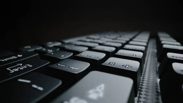 Close-up soft-focus laptop computer keyboard.
