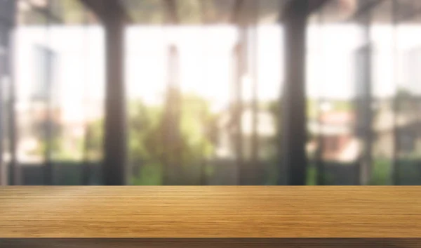 Wood table in city center modern office background — Stock Photo, Image