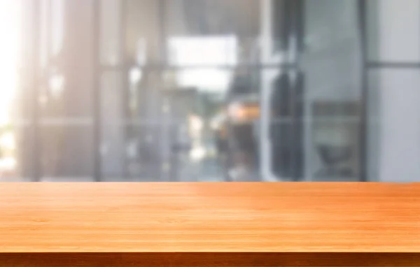 Wood table in city center modern office background
