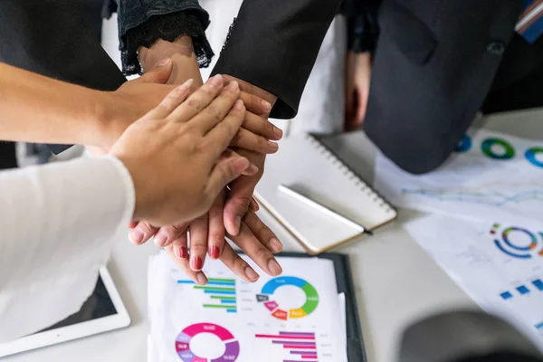 Many happy business people join hands together. — Stock Photo, Image