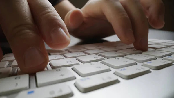 Close-up soft-focus finger typing on keyboard. — Stock Photo, Image