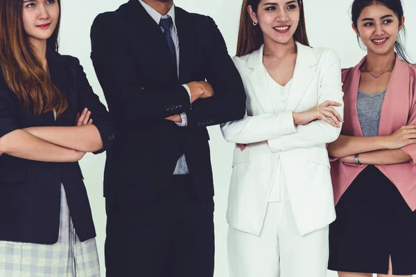 Businesswomen and businessman standing in office. — Stock Photo, Image