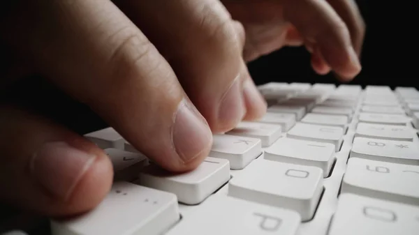 Close-up soft-focus finger typing on keyboard. — Stock Photo, Image