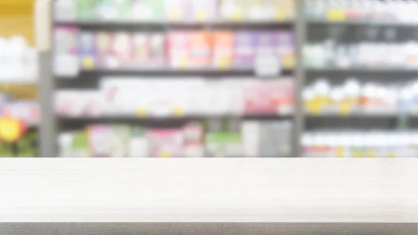 Table en bois en pharmacie ou fond de pharmacie . — Photo