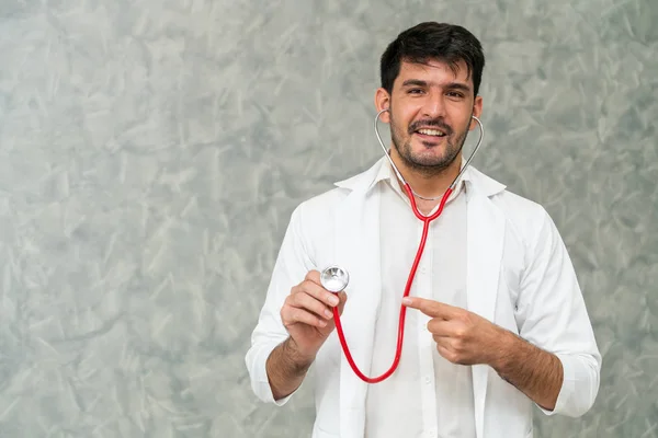 Young male doctor working at the hospital. — Stock Photo, Image