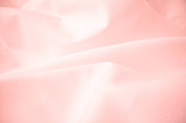 Makro çekimde parlak akan bez dokusu.