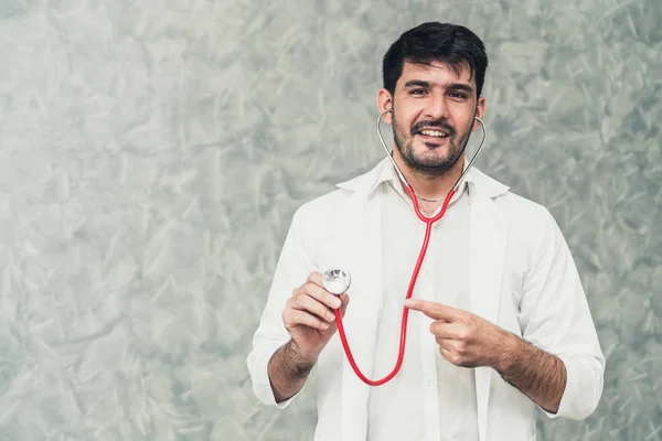 Young male doctor working at the hospital. — Stock Photo, Image