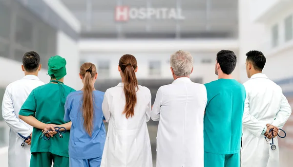 Healthcare profession teamwork and doctor service concept - International medical staff group of doctors, nurses and surgeon specialist standing with stethoscopes in the hospital.
