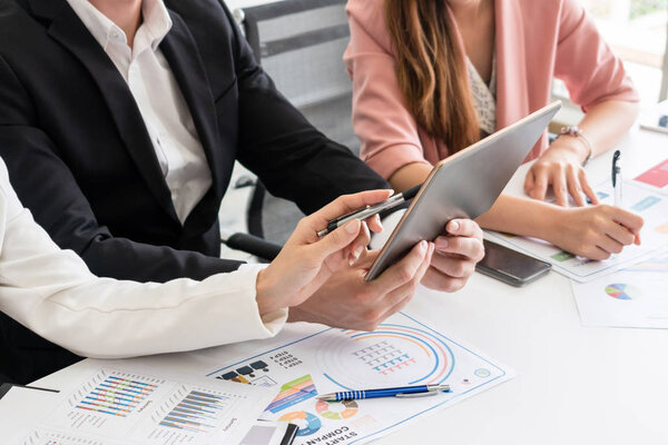 Businessman and businesswomen working in office.