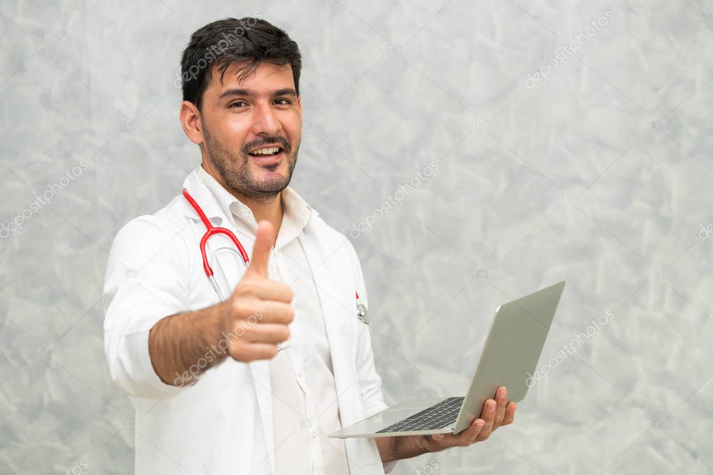 Doctor using laptop computer at the hospital. 