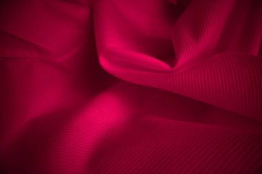 Makro çekimde parlak akan bez dokusu.