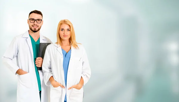 Doctors working with colleague in the hospital. — Stock Photo, Image