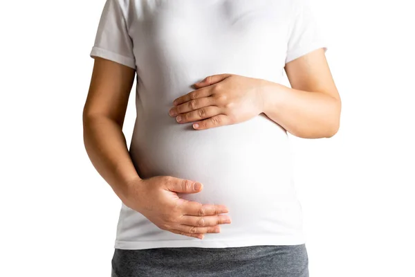 Wanita hamil bahagia terisolasi di latar belakang putih . — Stok Foto