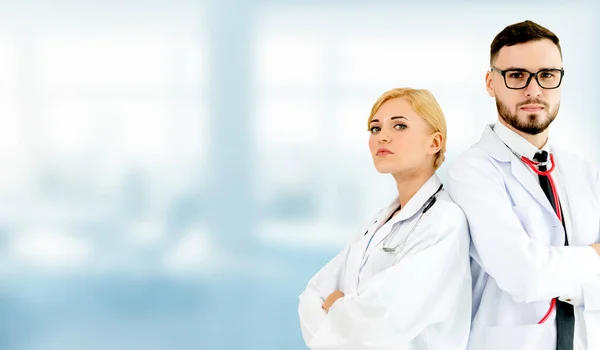 Doctors working with colleague in the hospital. — Stock Photo, Image