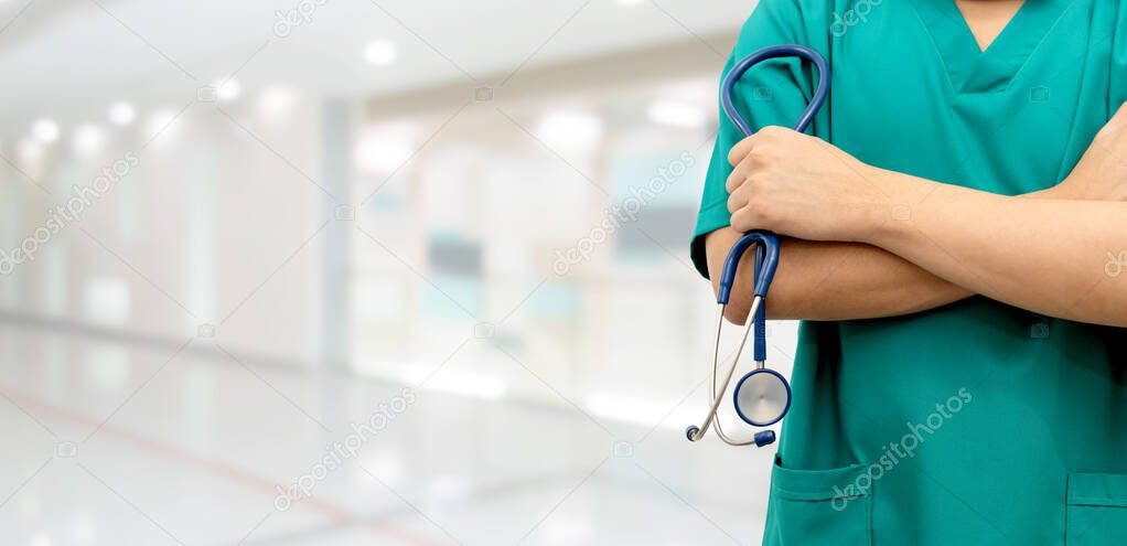 Surgeon doctor standing in hospital. Medical healthcare staff and doctor service.