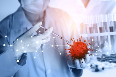 Coronavirus COVID 19 tıbbi test aşısı araştırma ve geliştirme konsepti. COVID-19 için ilaç tedavisi üretmek üzere Coronavirus antikor bilimsel örneklerini inceleyen ve analiz eden bilim insanları.