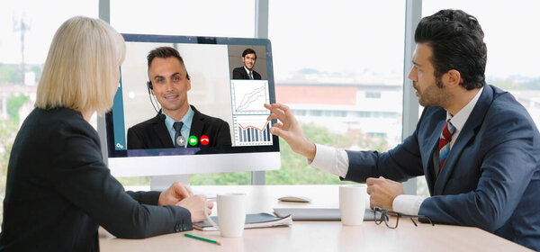 Video call group business people meeting on virtual workplace or remote office. Telework conference call using smart video technology to communicate colleague in professional corporate business.