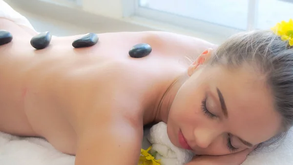 Woman Getting Hot Stone Massage Treatment Professional Beautician Therapist Spa — Stock Photo, Image