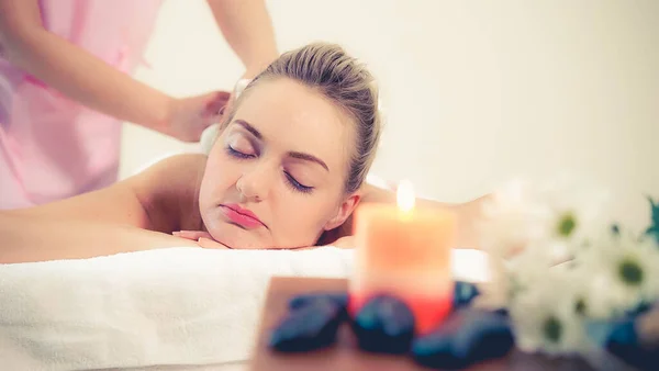 Massage Therapist Holds Herbal Compress Treatment Woman Lying Spa Bed — Stock Photo, Image